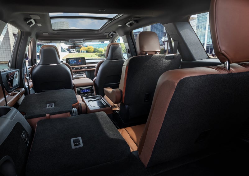 The interior of the 2025 Lincoln Aviator® SUV is shown with two seats folded down for added space. | Bayway Lincoln in Houston TX