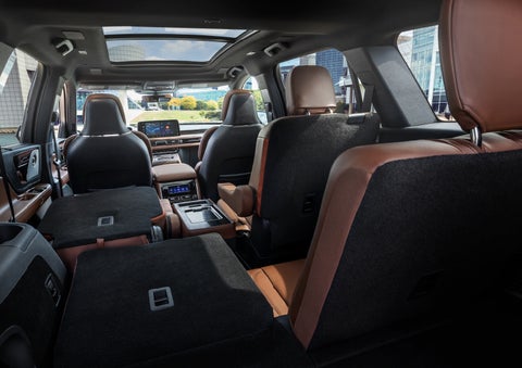 The interior of the 2025 Lincoln Aviator® SUV is shown with two seats folded down for added space. | Bayway Lincoln in Houston TX