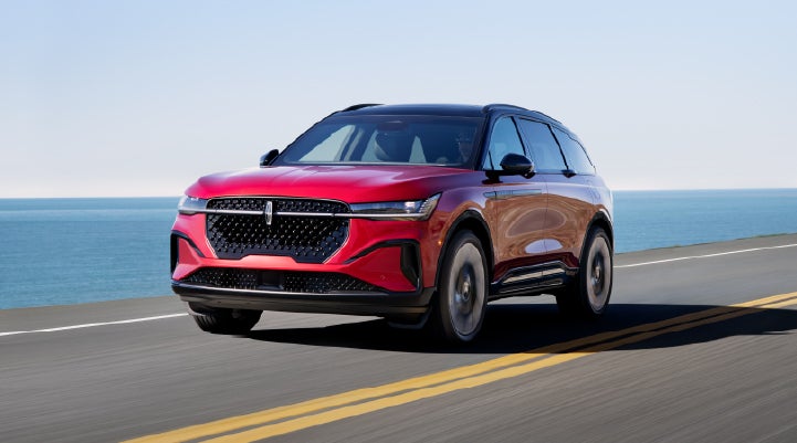 A 2025 Lincoln Nautilus® SUV is being driven on a seaside roadway. | Bayway Lincoln in Houston TX