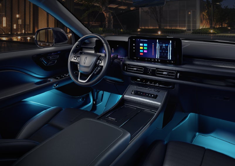 Deep blue ambient lighting glows from various places within a 2026 Lincoln Aviator® SUV. | Bayway Lincoln in Houston TX