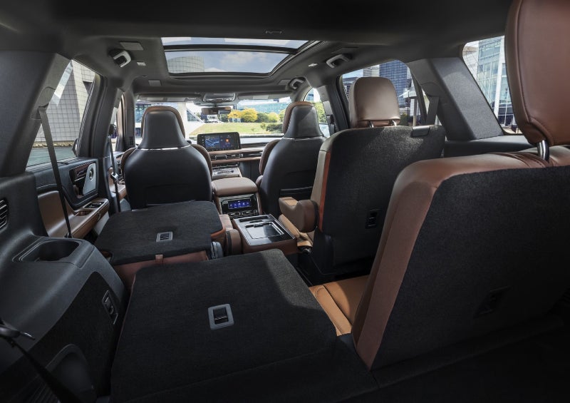One side of the PowerFold® third-row seat and a second-row seat are folded forward in the 2026 Lincoln Aviator® SUV. | Bayway Lincoln in Houston TX