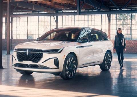 A person approaches a 2026 Lincoln Nautilus® SUV. | Bayway Lincoln in Houston TX