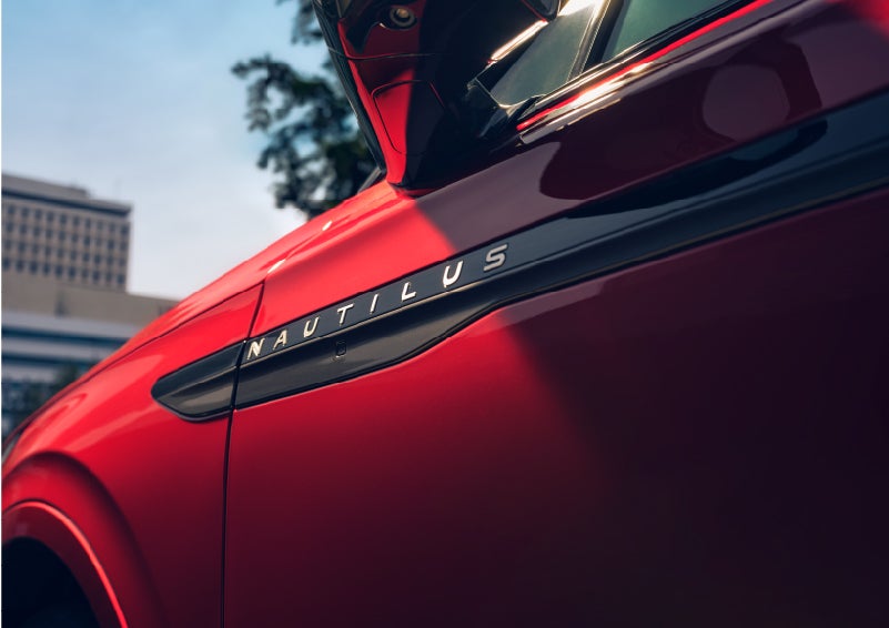 A side badge on the passenger door reads Nautilus. | Bayway Lincoln in Houston TX